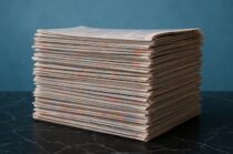 I Visa Media and Journalists, stack of newspapers